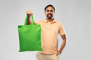 Image showing man with reusable canvas bag for food shopping