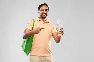 Image showing man with bag for food shopping and glass bottle