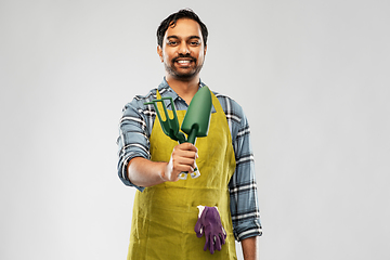 Image showing indian gardener or farmer with box of garden tools