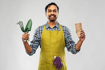 Image showing indian gardener or farmer with box of garden tools