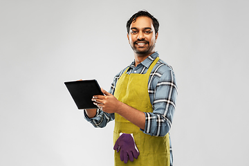 Image showing indian male gardener or farmer with tablet pc