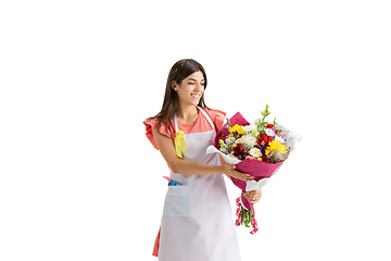 Image showing Young woman, florist with bouquet isolated on white studio background