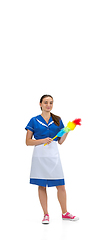 Image showing Portrait of female made, cleaning worker in white and blue uniform isolated over white background