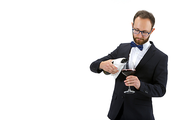 Image showing Portrait of male sommelier in suit isolated over white background