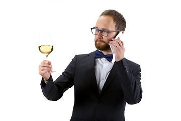 Image showing Portrait of male sommelier in suit isolated over white background