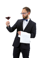 Image showing Portrait of male sommelier in suit isolated over white background