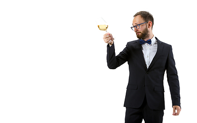 Image showing Portrait of male sommelier in suit isolated over white background