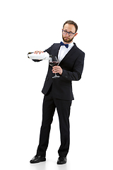 Image showing Portrait of male sommelier in suit isolated over white background