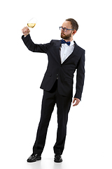 Image showing Portrait of male sommelier in suit isolated over white background