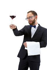 Image showing Portrait of male sommelier in suit isolated over white background