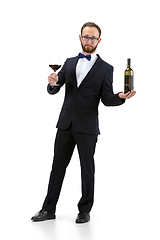 Image showing Portrait of male sommelier in suit isolated over white background