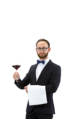 Image showing Portrait of male sommelier in suit isolated over white background