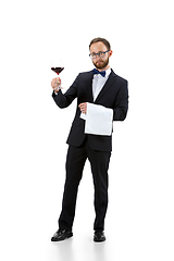 Image showing Portrait of male sommelier in suit isolated over white background