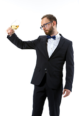 Image showing Portrait of male sommelier in suit isolated over white background