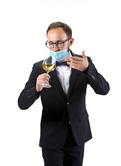 Image showing Portrait of male sommelier in suit isolated over white background