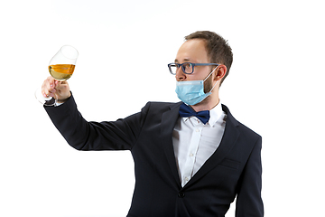 Image showing Portrait of male sommelier in suit isolated over white background