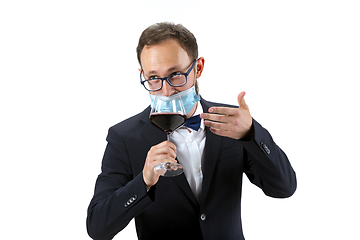 Image showing Portrait of male sommelier in suit isolated over white background