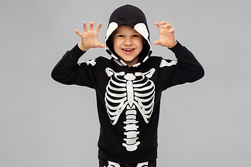 Image showing boy in halloween costume of skeleton making faces