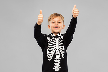 Image showing boy in black halloween costume showing thumbs up