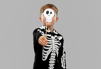 Image showing boy in halloween costume with scull accessory