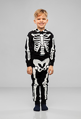 Image showing boy in black halloween costume with skeleton bones