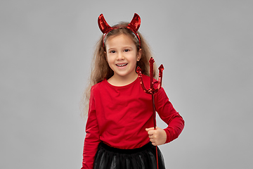 Image showing girl with trident and devil's horns on halloween