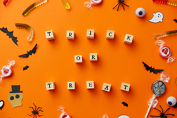 Image showing trick or treat letters and halloween sweets