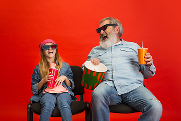 Image showing Senior man, grandfather having fun and spending time together with girl, granddaughter. Joyful elderly lifestyle concept