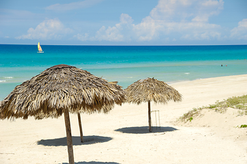 Image showing Parasols on tropical beach