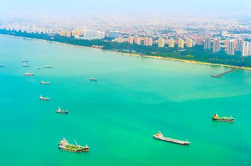 Image showing Singapore harbor with freight ships