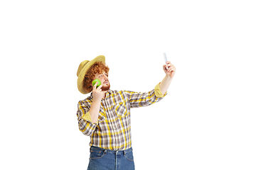 Image showing Handsome farmer, rancher isolated over white studio background