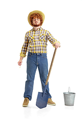 Image showing Handsome farmer, rancher isolated over white studio background