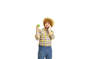 Image showing Handsome farmer, rancher isolated over white studio background