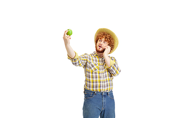 Image showing Handsome farmer, rancher isolated over white studio background