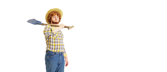 Image showing Handsome farmer, rancher isolated over white studio background