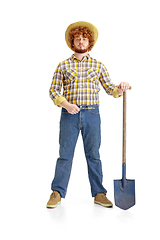 Image showing Handsome farmer, rancher isolated over white studio background