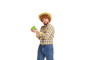 Image showing Handsome farmer, rancher isolated over white studio background