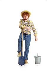 Image showing Handsome farmer, rancher isolated over white studio background