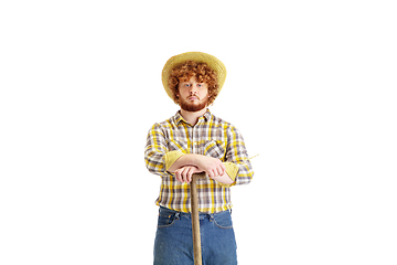 Image showing Handsome farmer, rancher isolated over white studio background