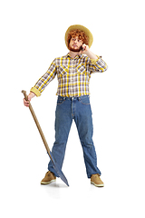 Image showing Handsome farmer, rancher isolated over white studio background