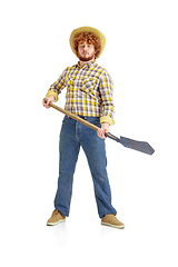 Image showing Handsome farmer, rancher isolated over white studio background