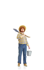 Image showing Handsome farmer, rancher isolated over white studio background