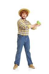 Image showing Handsome farmer, rancher isolated over white studio background