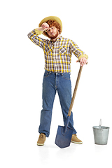 Image showing Handsome farmer, rancher isolated over white studio background