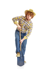 Image showing Handsome farmer, rancher isolated over white studio background