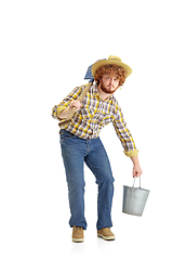 Image showing Handsome farmer, rancher isolated over white studio background