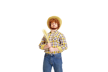 Image showing Handsome farmer, rancher isolated over white studio background