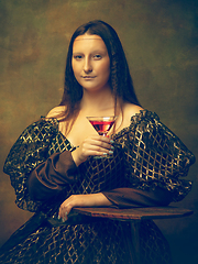 Image showing Young woman as Mona Lisa on dark background. Retro style, comparison of eras concept.