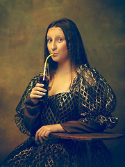 Image showing Young woman as Mona Lisa on dark background. Retro style, comparison of eras concept.