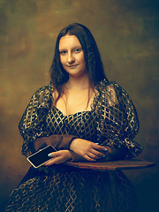 Image showing Young woman as Mona Lisa on dark background. Retro style, comparison of eras concept.